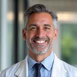 Retrato del Dr. Javier Vallejo, Médico Especialista en Bienestar